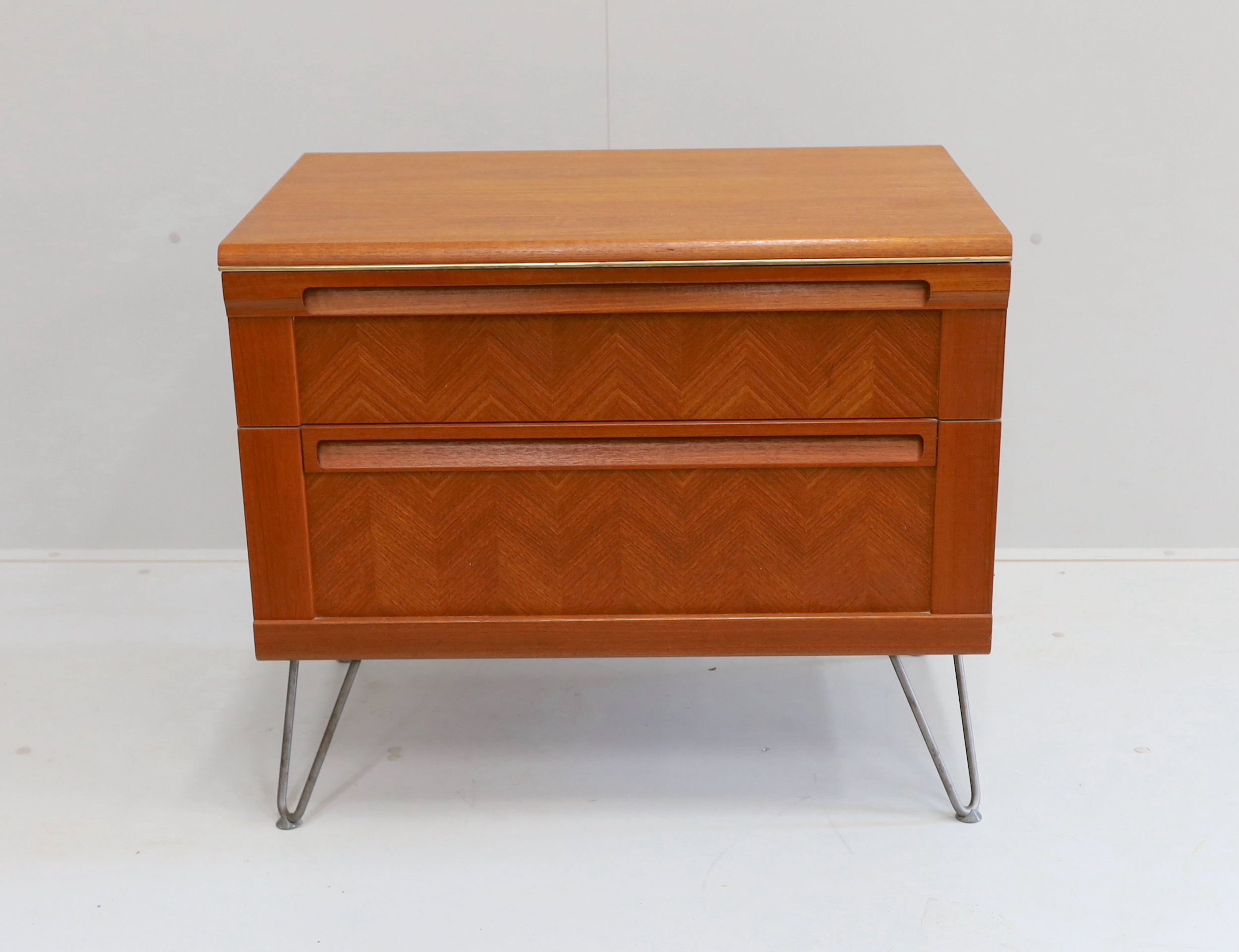 A G Plan “Herringbone” teak two drawer chest on hair pin legs, width 76cm, depth 50cm, height 65cm